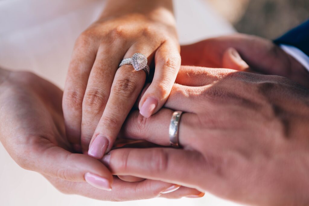 hands with wedding bands